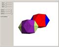 Dissecting Two Bilinski Dodecahedra into a Cube